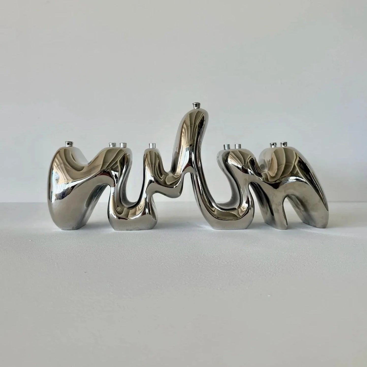 Chrome Menorah Sculpture